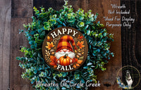 a wreath with a picture of a gnome on it