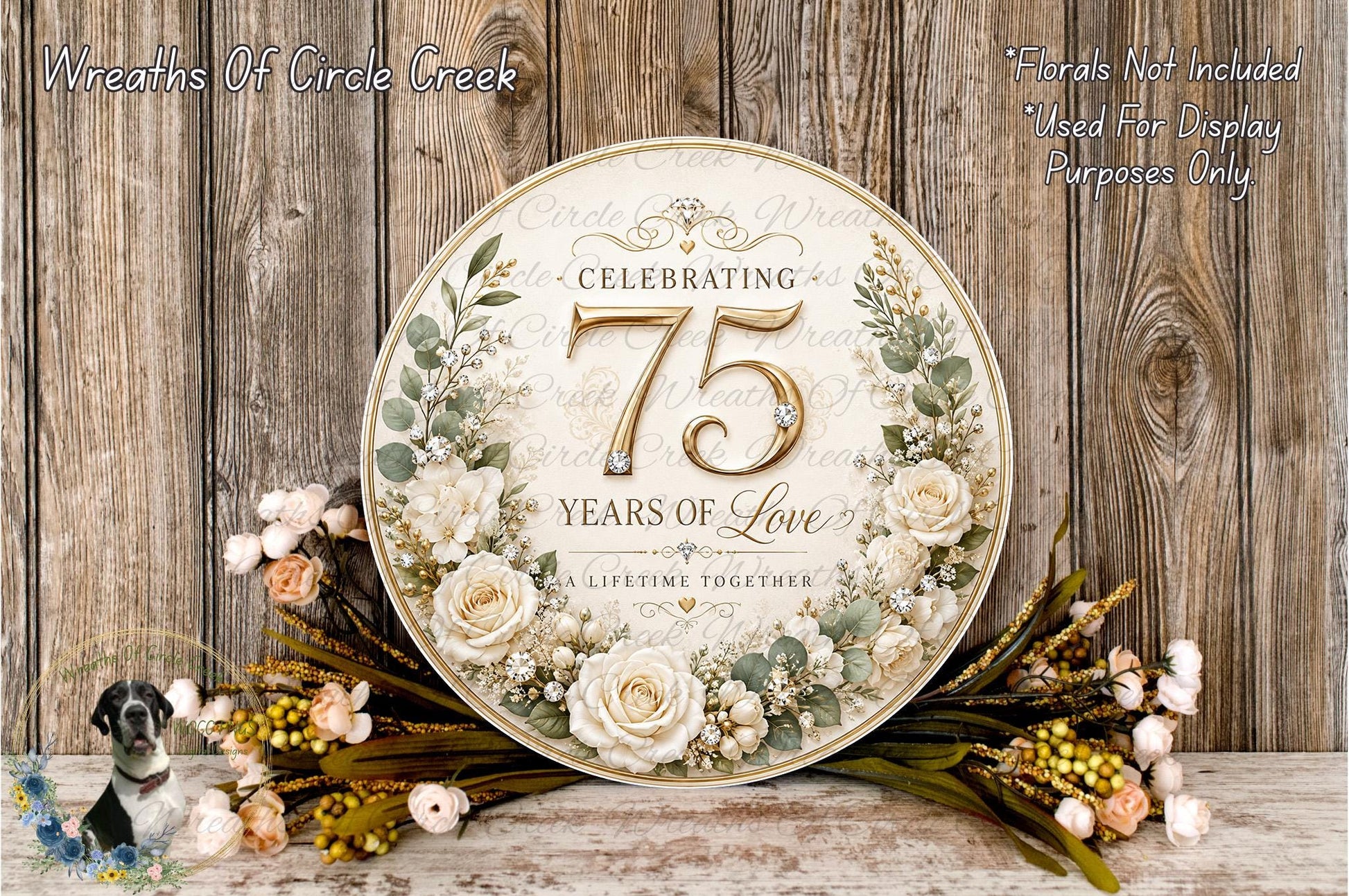 A decorative sign celebrating 75 years of love, surrounded by a floral arrangement and placed on a wooden surface.