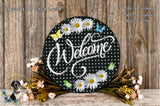 a sign that says welcome with daisies on it