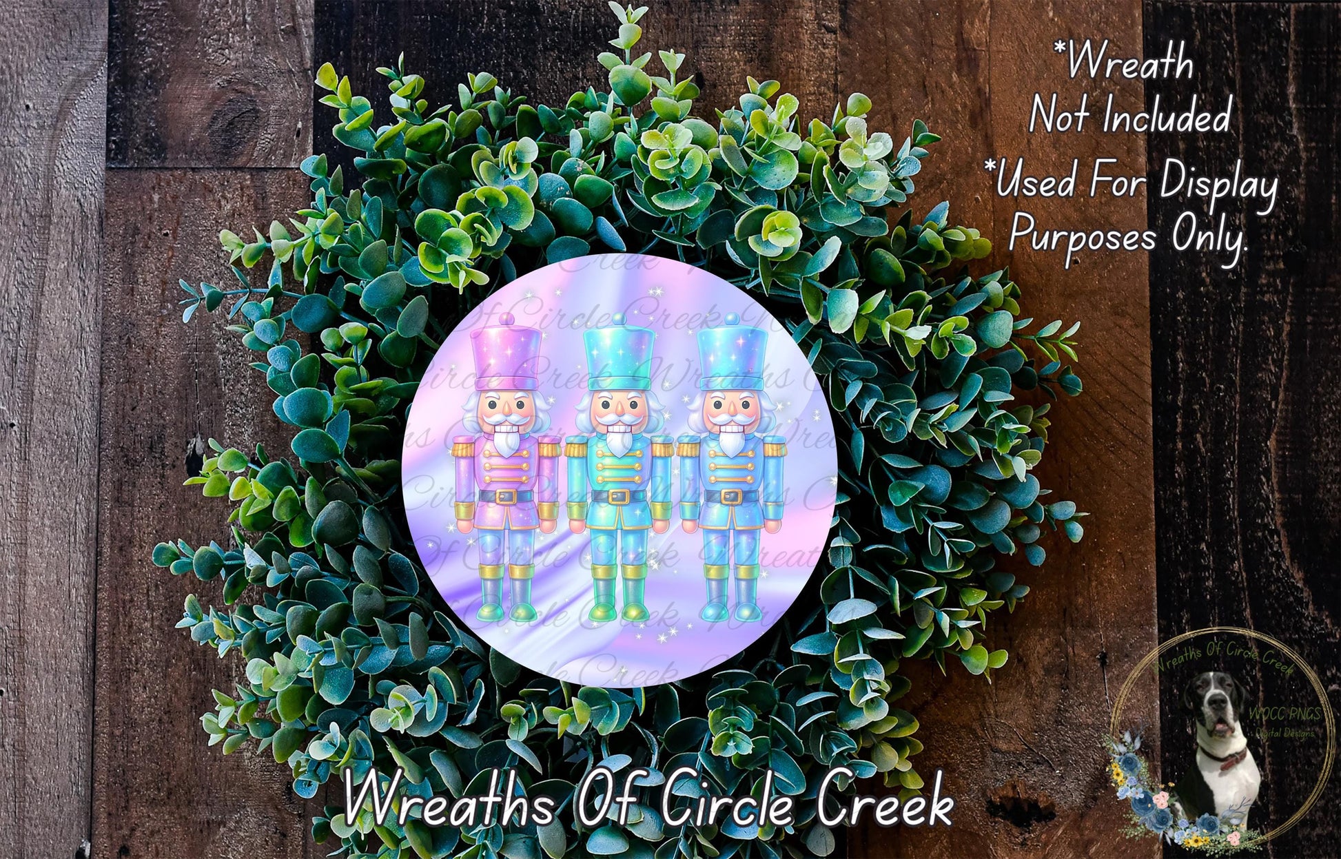A wreath made of green leaves and a circular design featuring three nutcracker figurines in different colored outfits.