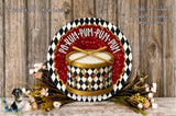a picture of a drum and some flowers on a table