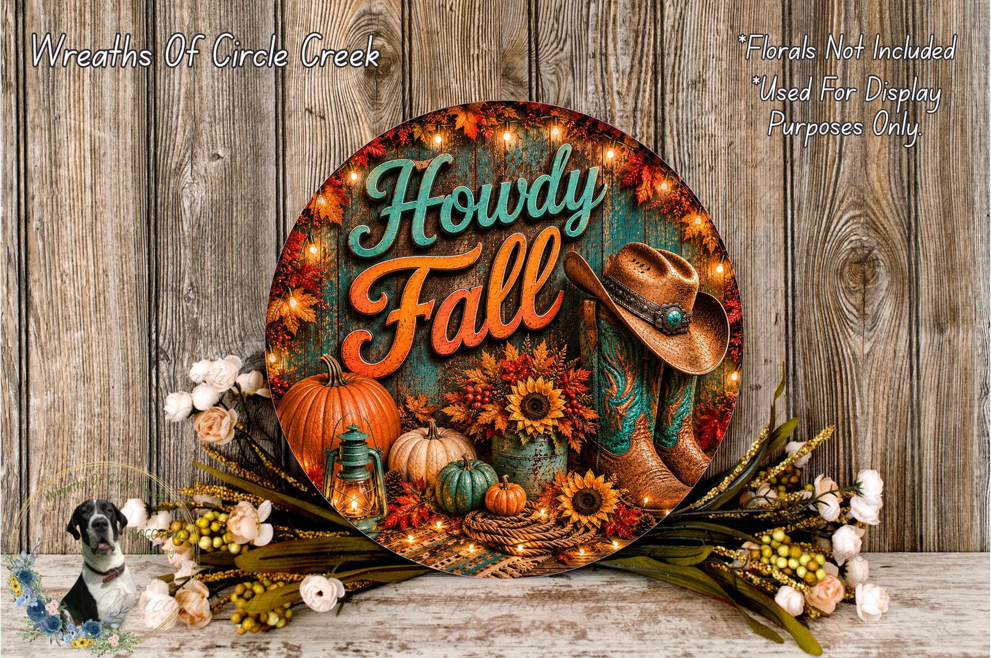 A decorative sign for "Howdy Fall" featuring a cowboy hat, pumpkins, sunflowers, and other fall-themed items, surrounded by a floral arrangement and lit candles.