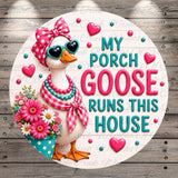 A whimsical illustration of a duck wearing sunglasses and a bow, holding a bouquet of flowers, with the text "My Porch Goose Runs This House" surrounding the image.