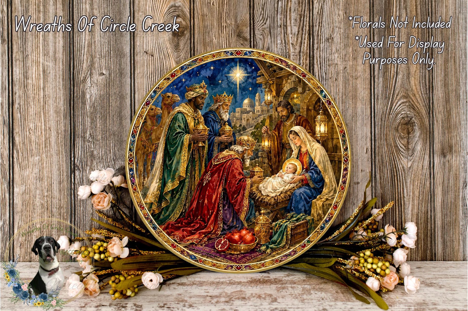 A decorative plate featuring a painting of the Nativity scene, with the Three Wise Men and the baby Jesus surrounded by flowers and greenery.