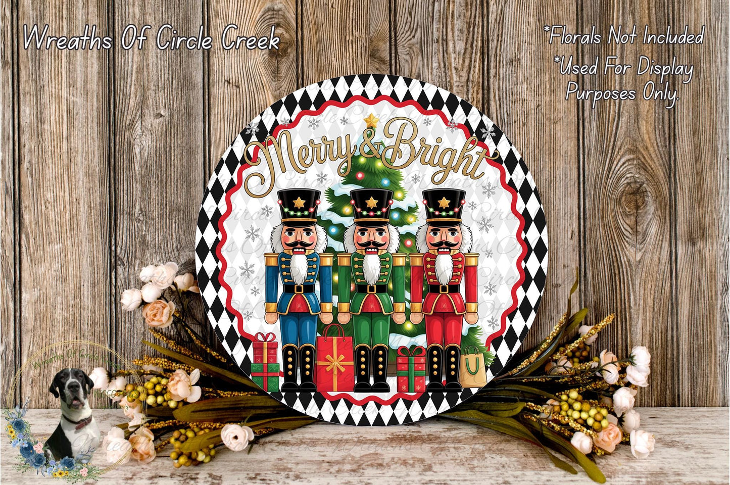 A decorative wreath featuring nutcracker soldiers and a Christmas tree, with the text "Merry & Bright" displayed on the wreath. The wreath is surrounded by flowers and placed on a wooden surface.