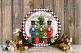 A decorative wreath featuring nutcracker soldiers and a Christmas tree, with the text &quot;Merry & Bright&quot; displayed on the wreath. The wreath is surrounded by flowers and placed on a wooden surface.