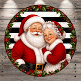 Santa Claus and his reindeer, with a black and white striped border, are depicted in a festive holiday scene.