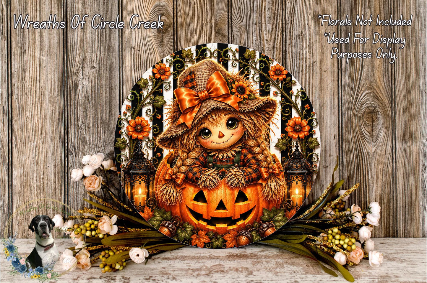 a Halloween-themed wreath with a pumpkin and a scarecrow, surrounded by flowers and greenery.