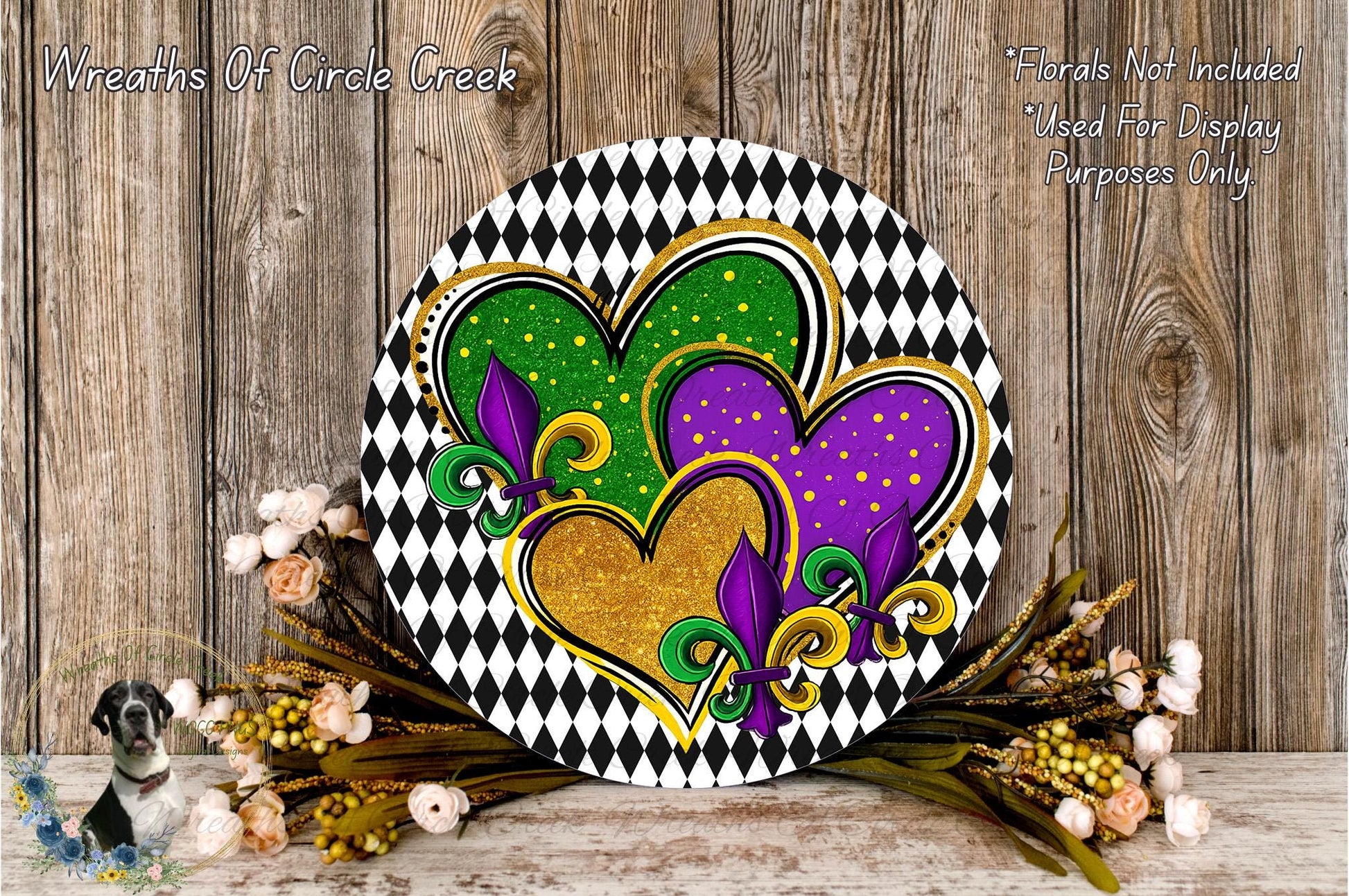 a decorative wreath with a black and white checkered pattern, adorned with colorful hearts and fleur-de-lis flowers. The wreath is placed on a wooden surface, surrounded by a floral arrangement.