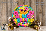 A colorful, decorative wreath with the text "Hello Sunshine" in the center, surrounded by various flowers and foliage.