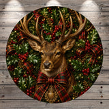 A deer with large antlers is surrounded by a festive Christmas wreath, featuring red berries, holly leaves, and plaid ribbons.