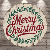 A circular wooden sign with the text &quot;Merry Christmas&quot; in a decorative font, surrounded by a wreath of green leaves.