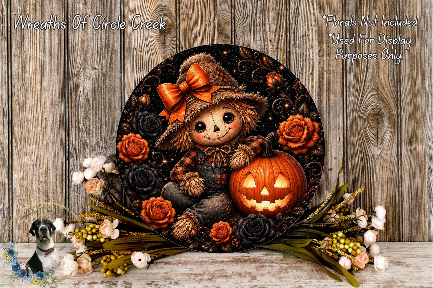 A Halloween-themed wreath featuring a scarecrow, a carved pumpkin, and various fall flowers and foliage.