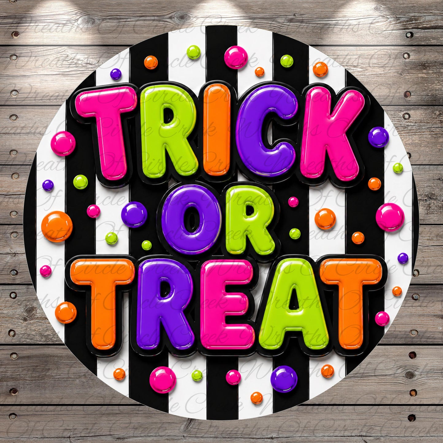 A colorful and playful design featuring the text "TRICK OR TREAT" surrounded by various shapes and colors, including circles, dots, and stripes.