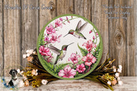 a picture of a hummingbird with pink flowers on it