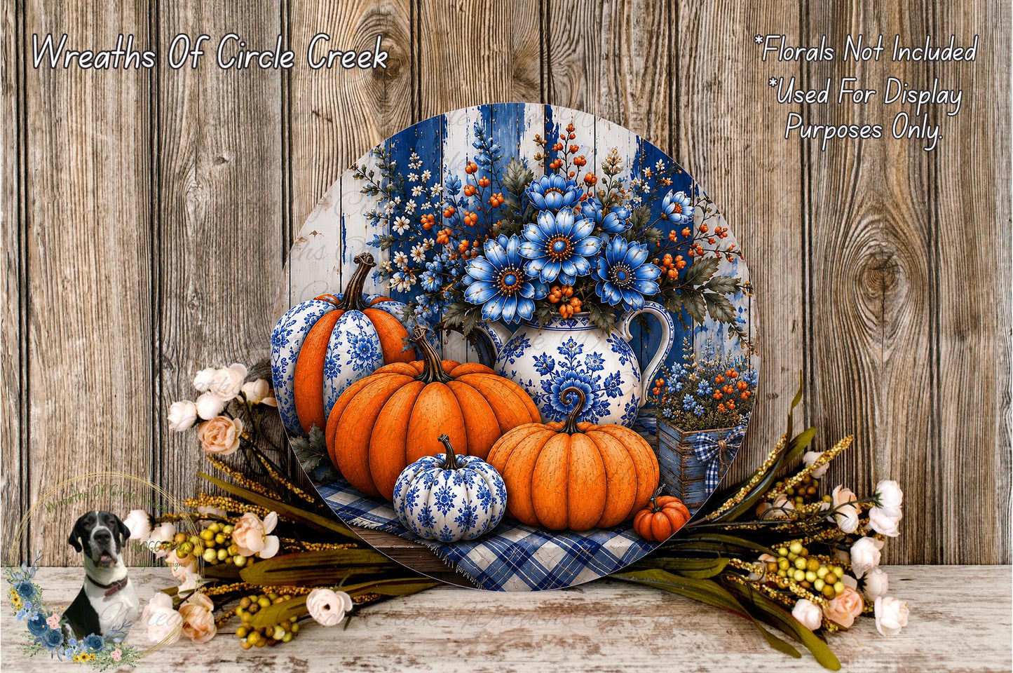 A decorative arrangement of pumpkins, flowers, and a vase on a wooden surface, with a text overlay providing information about the wreaths of circle creek.