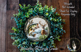 A wreath made of green foliage and featuring a deer and a fish, with a text overlay that reads "Wreath Not Included * Used For Display Purposes Only" and "Wreaths Of Circle Creek".