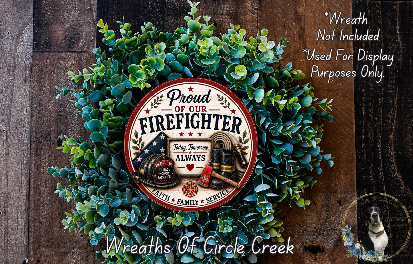 A wreath made of green leaves and a red and white sign that says "Proud of Our Firefighter" is displayed on a wooden surface.