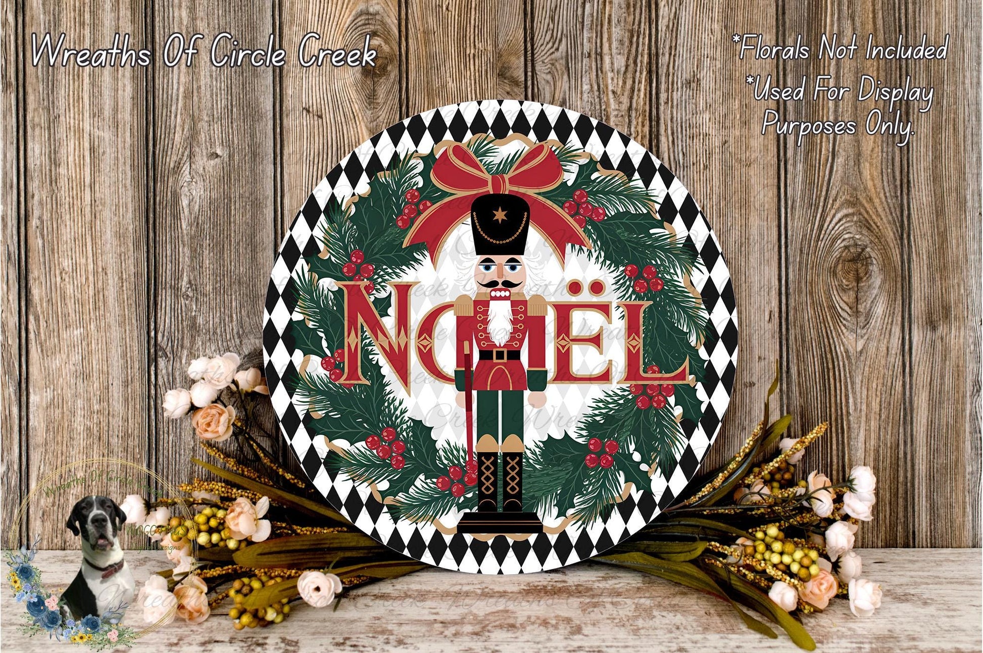 A decorative wreath with the word "Nühl" prominently displayed in the center, surrounded by a nutcracker figure and holiday-themed elements such as pine branches and flowers.