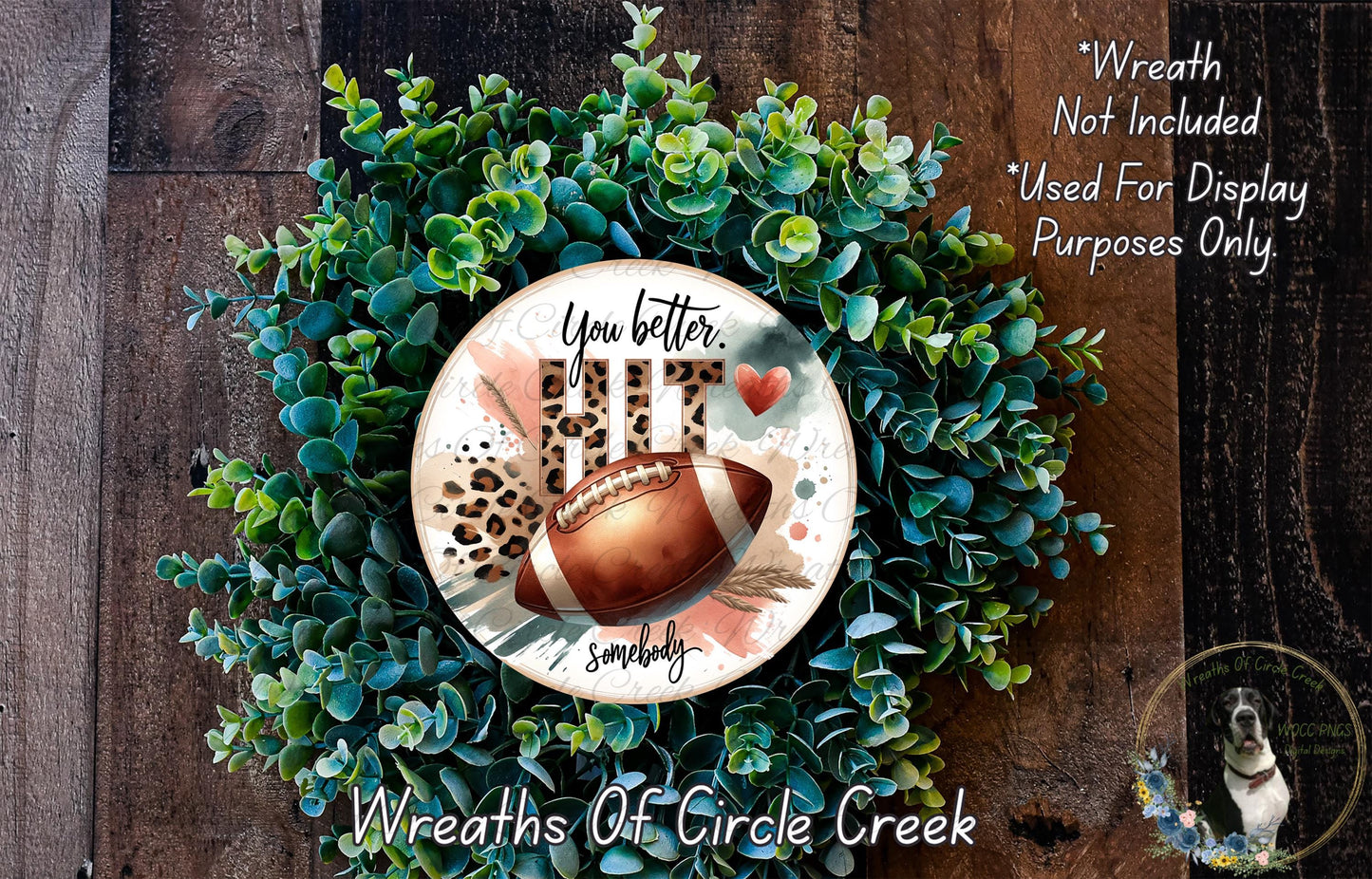 A wreath made of green leaves and a brown football, with the text "You better. Somebody somewhere" on it.