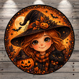A young girl with long, curly hair wearing a witch's hat and holding a carved jack-o-lantern is surrounded by a festive Halloween scene, including a black cat and a pumpkin.