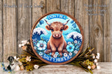 a picture of a cow with flowers on it