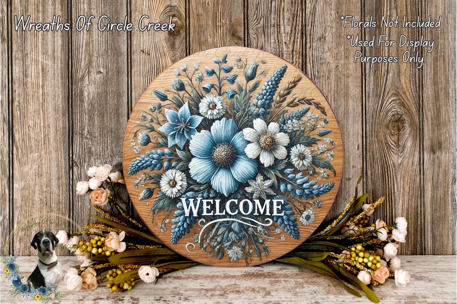 a picture of a welcome sign with flowers on it