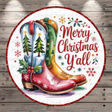 A festive Christmas-themed image featuring a pair of colorful cowboy boots with snowflake decorations, surrounded by the text "Merry Christmas Y'all" against a wooden background.