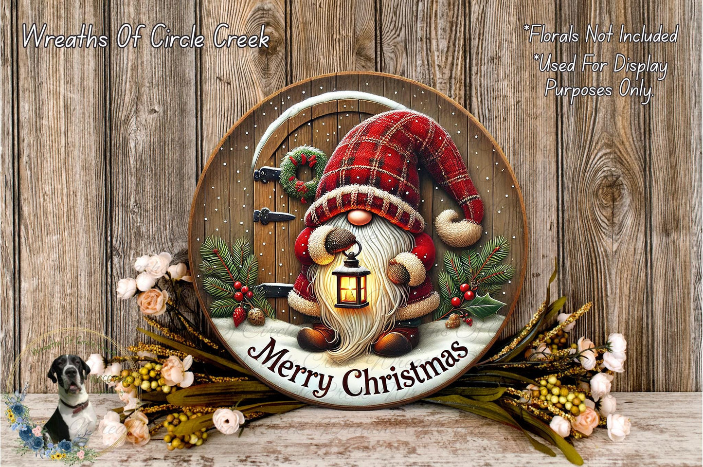 A round wooden plaque featuring a gnome holding a lantern, surrounded by holiday decorations such as flowers and greenery, with the text "Merry Christmas" displayed on it.