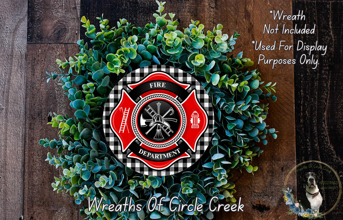 a wreath made of green foliage and a red and black fire department emblem, with the text "Wreath Not Included * Used For Display Purposes Only" and "Wreaths Of Circle Creek" below it.