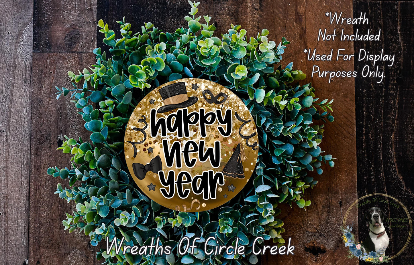 A wreath made of green leaves and a golden circular sign that says "Happy New Year".