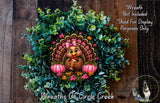 A wreath featuring a cartoon turkey holding a football, surrounded by green foliage and two pumpkins, with a wooden background.