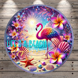A vibrant and colorful illustration of a flamingo surrounded by tropical flowers, shells, and a beach scene, with the text "Life's a Beach Enjoy the Waves" prominently displayed.