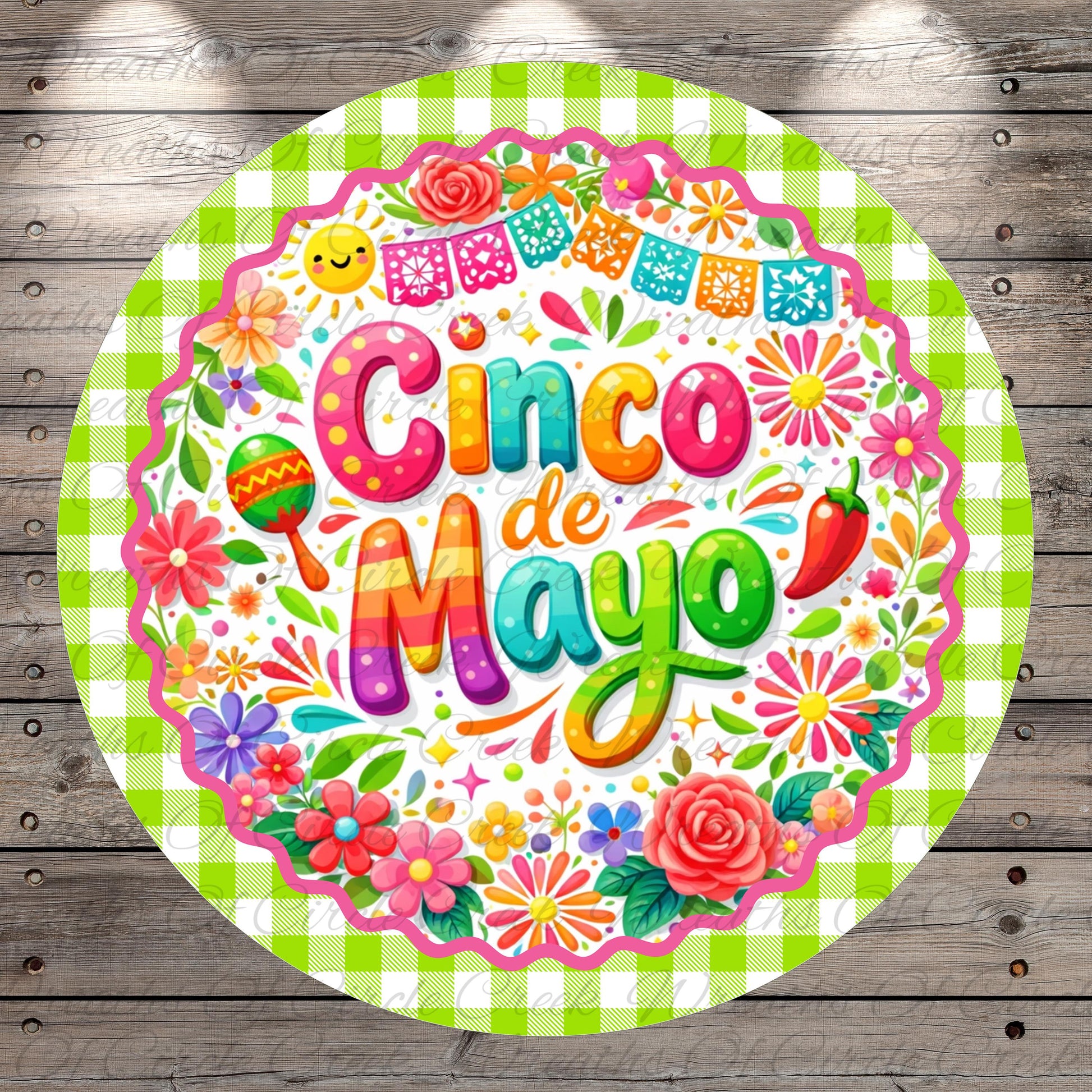 The image is a vibrant and colorful illustration of the text "Cinco de Mayo" surrounded by various festive elements such as flowers, banners, and a mariachi band.