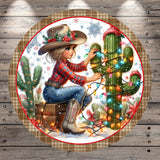 A woman in a cowboy hat sits on a suitcase, surrounded by a festive Christmas scene with a cactus and colorful lights.