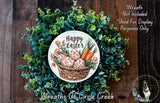 a wreath made of green foliage and decorated with a basket of Easter eggs and carrots. The wreath is displayed on a wooden surface, and there is a text overlay that reads "Happy Easter" and "Wreath Not Included * Used For Display Purposes Only".