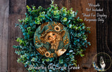 a wreath with a woman's face and a cat, surrounded by green leaves and pumpkins. The wreath is displayed on a wooden surface, and there is a small dog in the bottom right corner of the image.