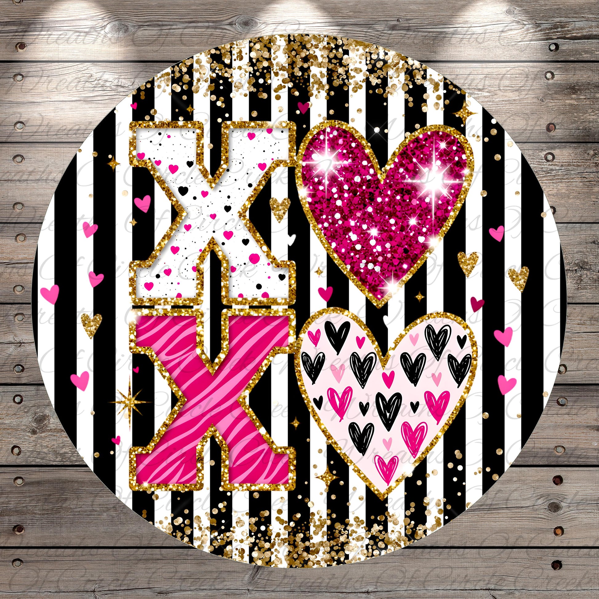 A circular design with a black and white striped background, featuring a large pink and white "X" surrounded by hearts and hearts in various colors.