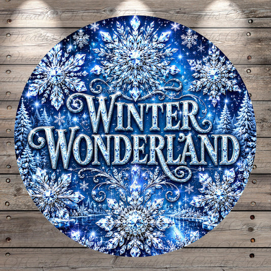 A circular sign with a winter wonderland theme, featuring snowflakes, trees, and sparkling lights against a dark blue background.
