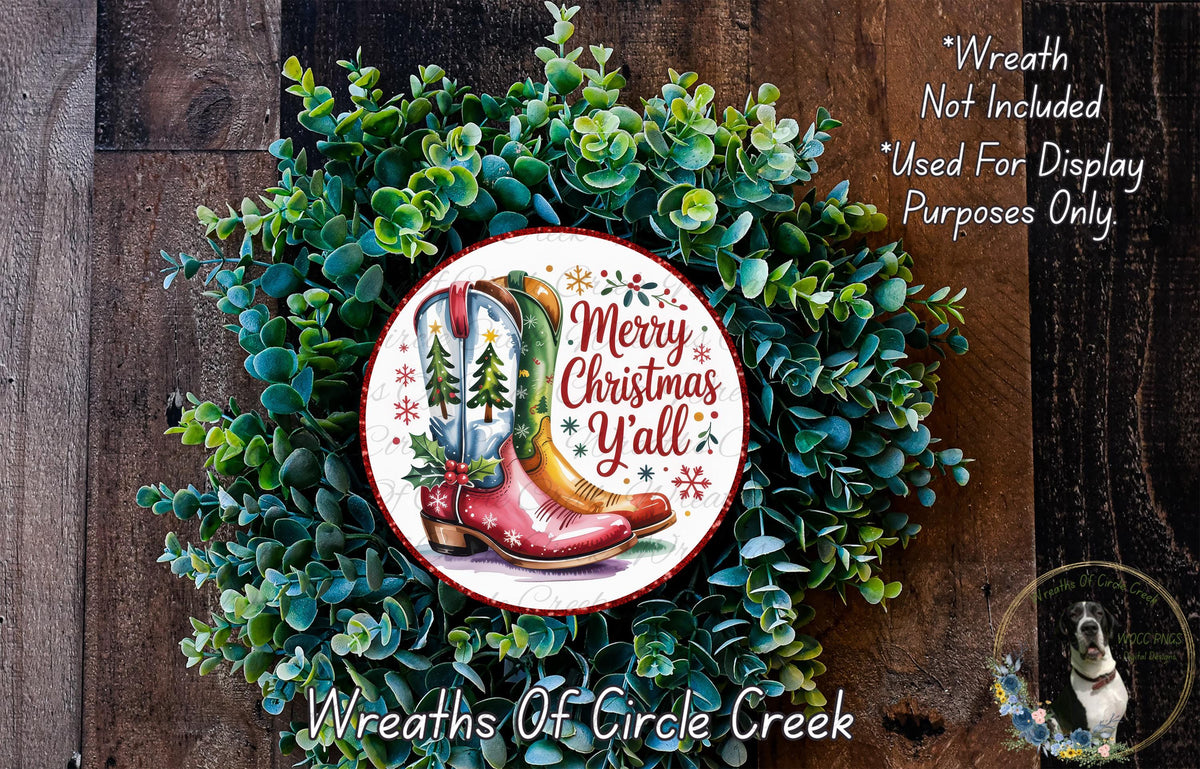 a wreath made of green foliage and a pair of red cowboy boots, with the text "Merry Christmas Y'all" displayed on the wreath.