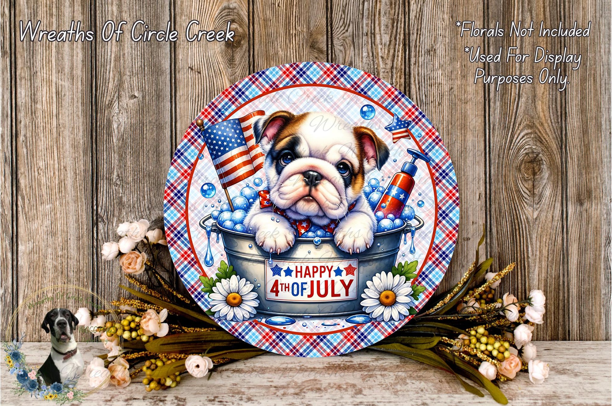 A decorative plate featuring a bulldog in a bucket, surrounded by flowers and an American flag, with the text "Happy 4th of July".