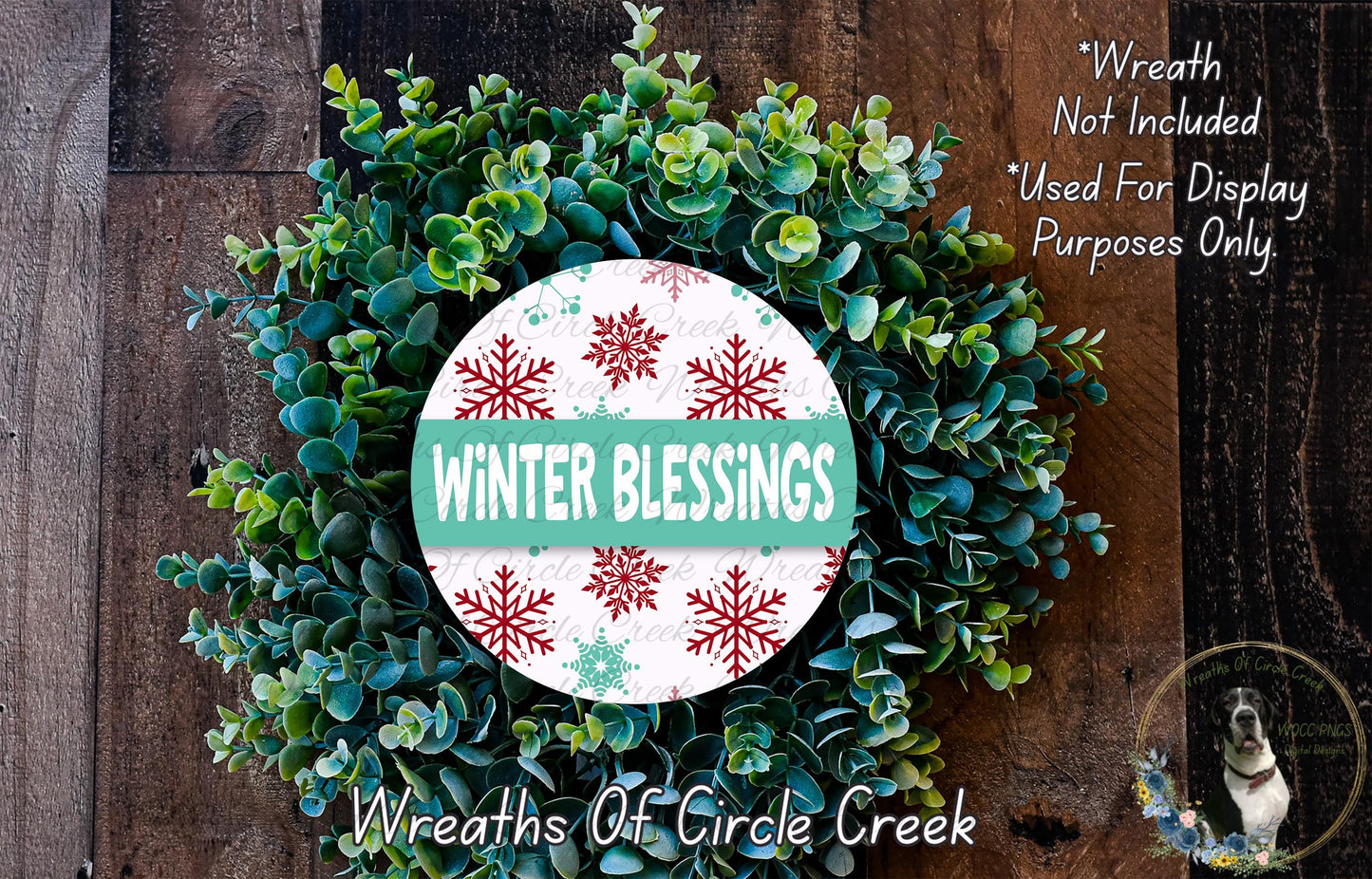 A wreath made of green leaves and red snowflakes, with the text "Winter Blessings" displayed on it.