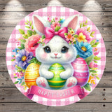A round, decorative Easter-themed sign featuring a white bunny holding three colorful Easter eggs, surrounded by a floral arrangement.