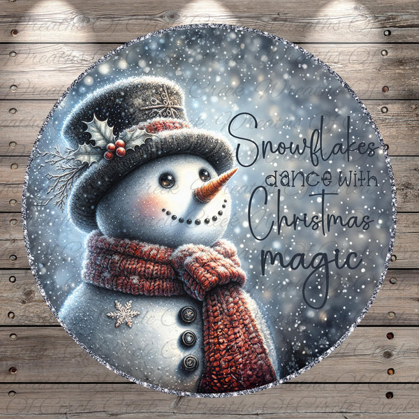 A snowman wearing a top hat and scarf, with the text "Snowflakes dance with Christmas magic" written around it, against a snowy background.