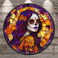 A colorful stained glass portrait of a woman with a sugar skull design, surrounded by a circular frame with a wooden background.