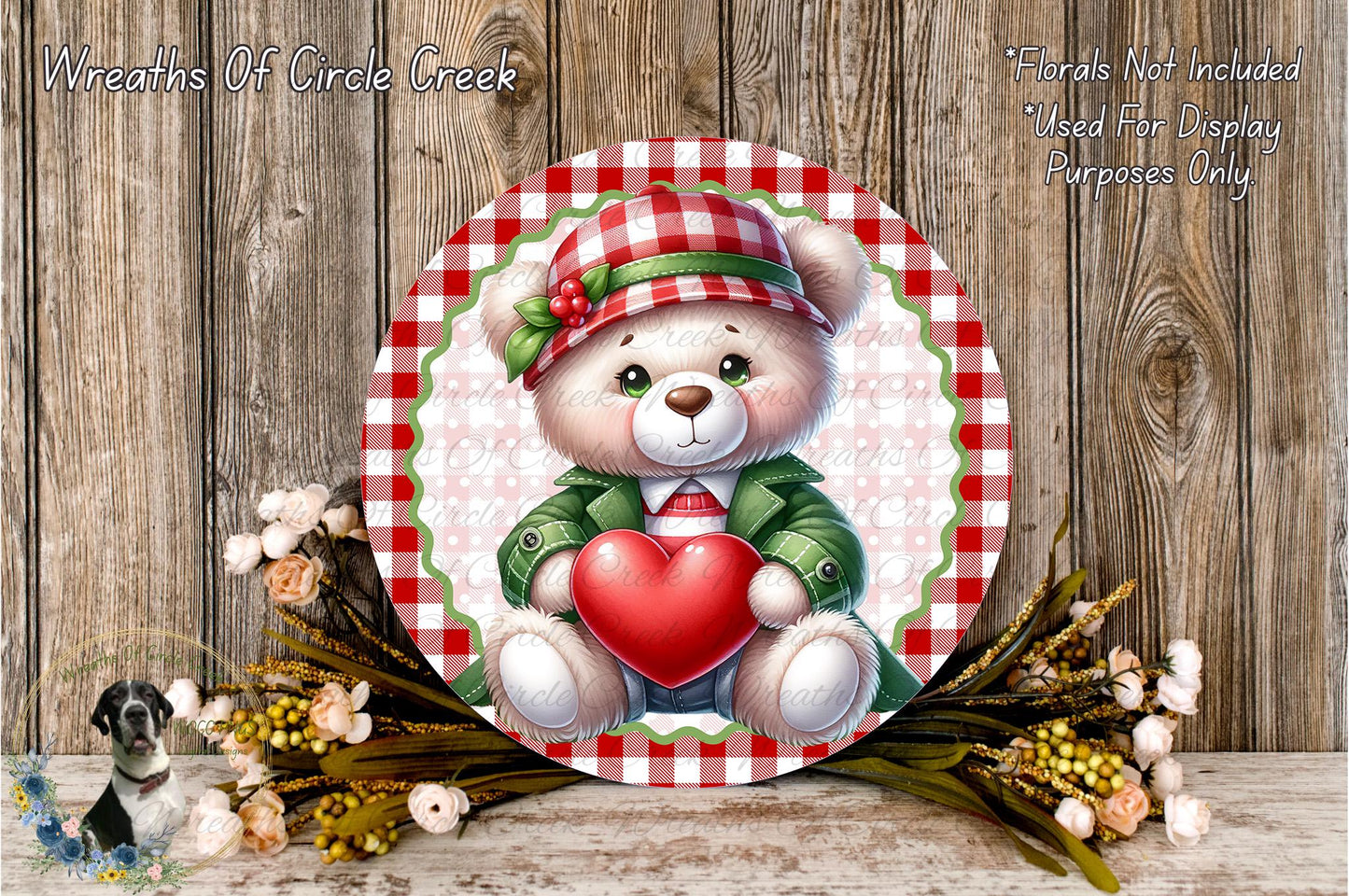 A round decorative plate featuring a white teddy bear holding a red heart, surrounded by a floral arrangement and a wooden background.