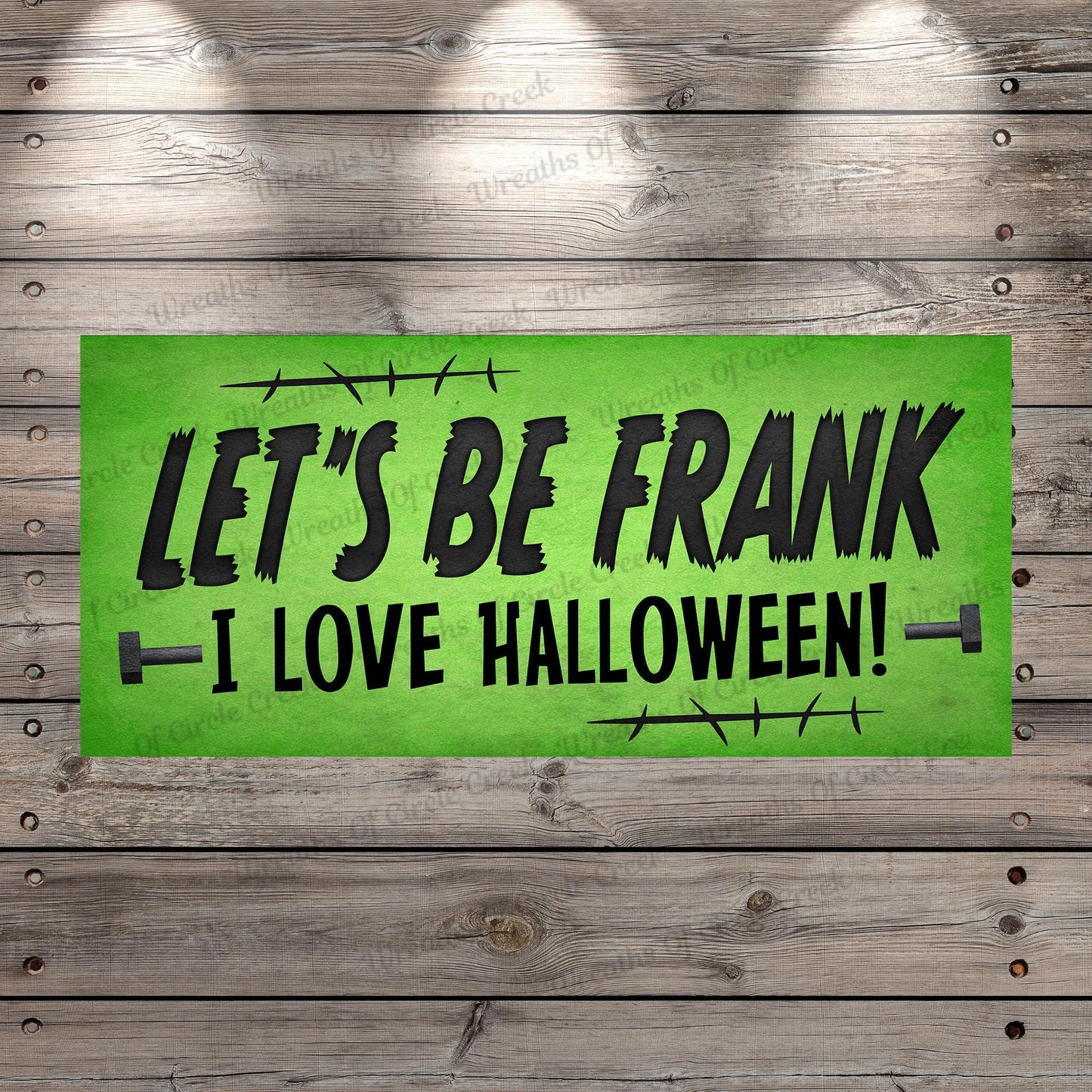 a green sign that says let's be frank i love halloween