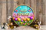 A colorful sign with the text "Hello Spring" surrounded by flowers and butterflies, placed on a wooden surface.