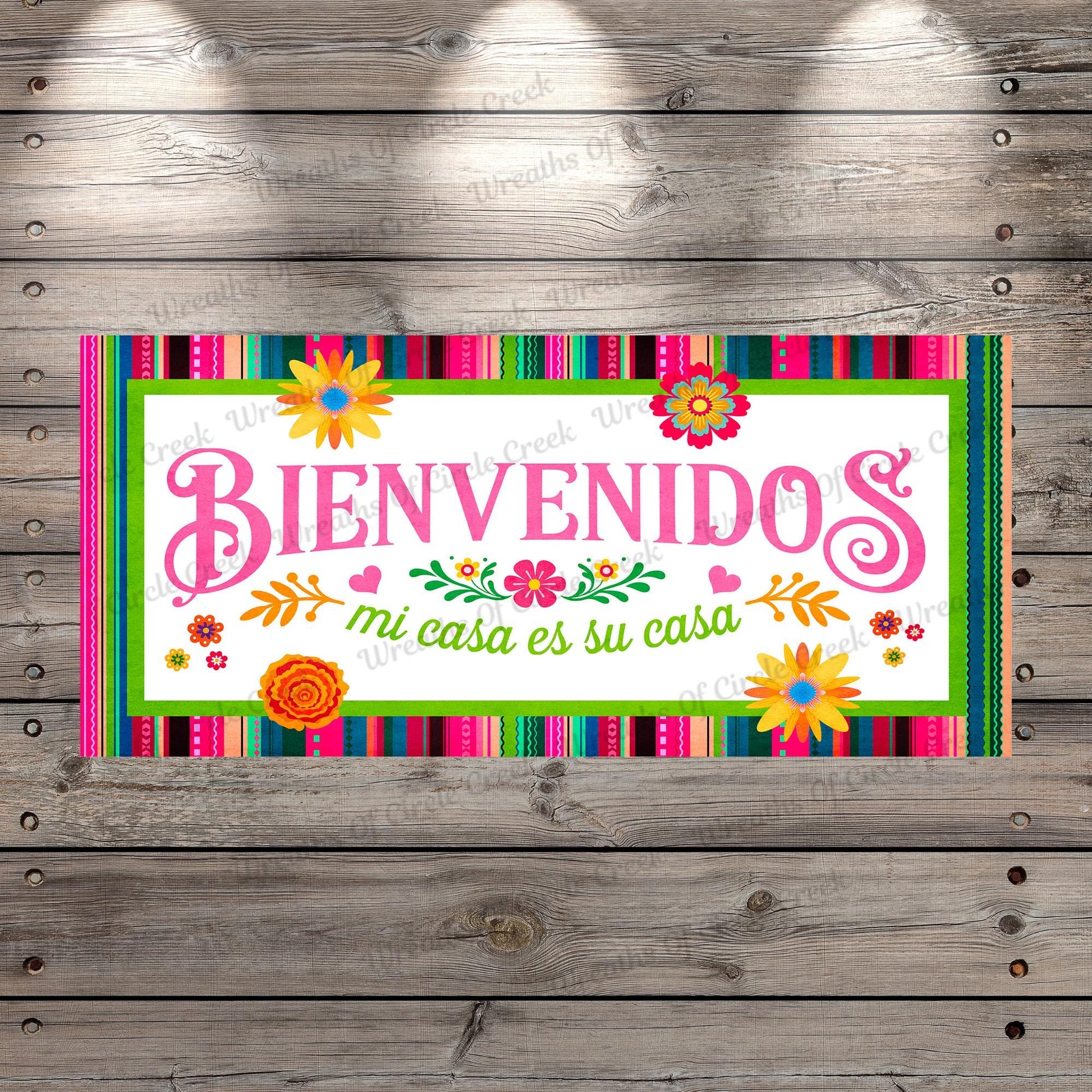 a sign that says benvendos on a wooden wall