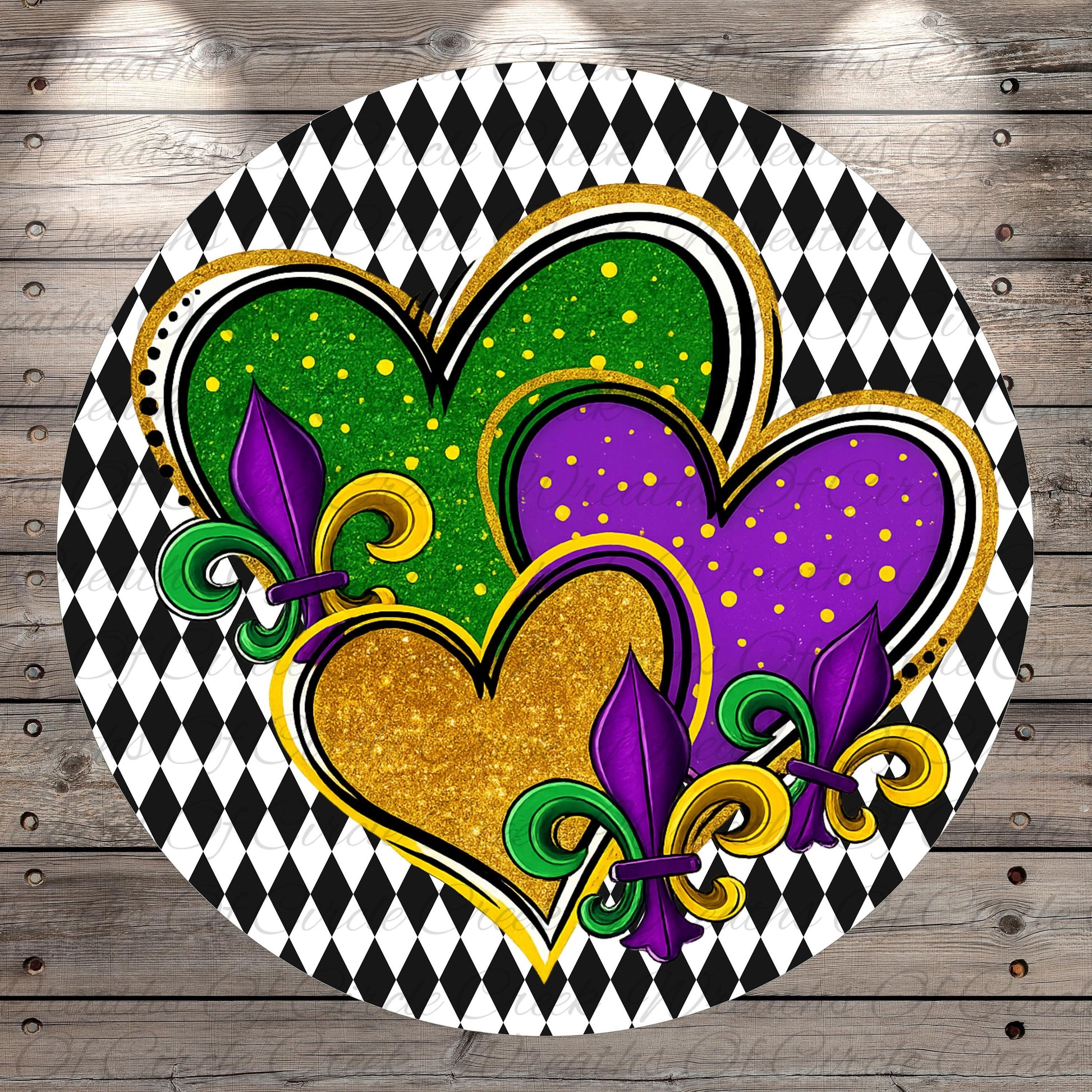 A circular design featuring three hearts in different colors - green, purple, and gold, along with fleur-de-lis flowers and a black and white diamond pattern.